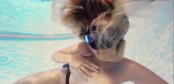  Sophie Murena blonde babe masturbating in the pool
